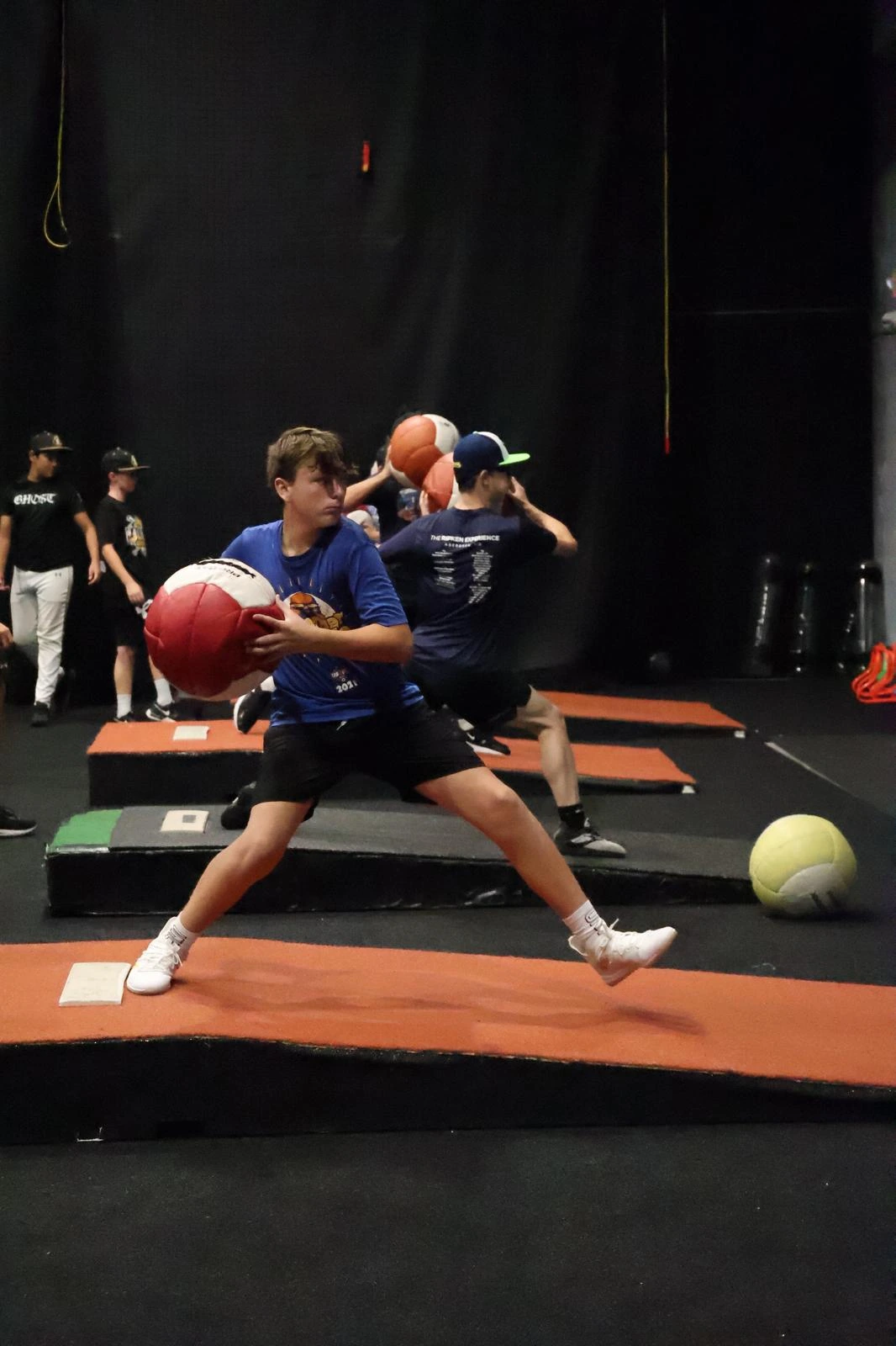 Youth athlete in a medicine ball session